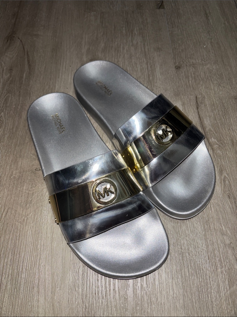 Michael Kors Silver Slide Sandals with Gold Logo Accent